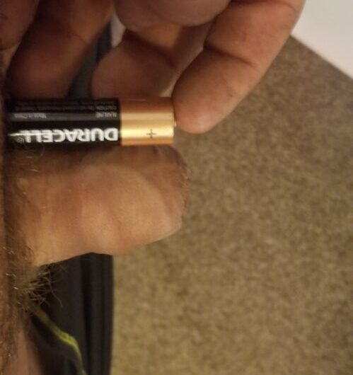 Tiny cock is smaller than a battery