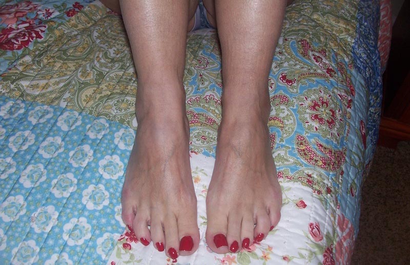Redhead cougar barefoot teasing foot slaves