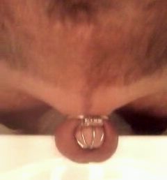 My tiny dick in chastity cage
