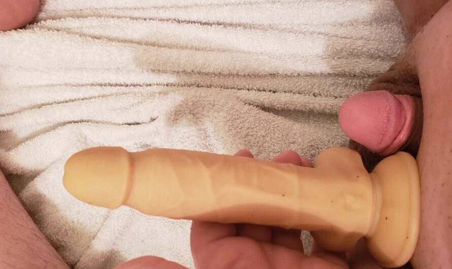 Clitty as small as the balls of the dildo